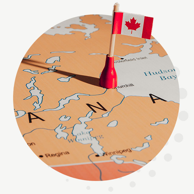 A close up of a map of Canada with a Canadian flag marker near the town of Churchill.